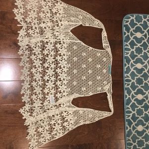 Delicately made, laces flower vest